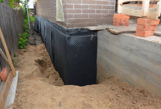 SJ Waterproofing Pros technician performing targeted Foundation Crack Repair assessment in Oakpark, VA